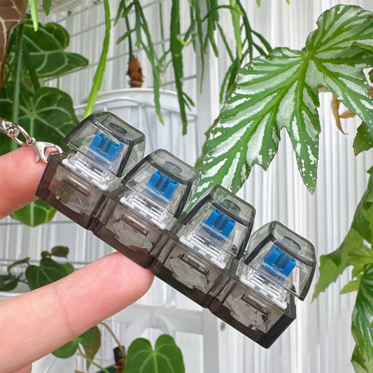LED-es fényű billentyűzetes fidget játék